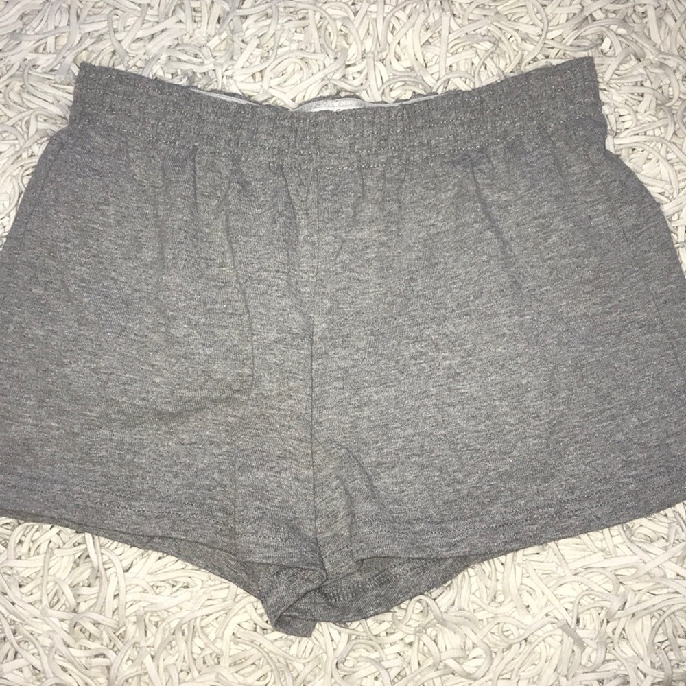 soffe shorts in grey, pink, and black.